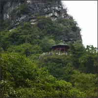 Pavilion tucked beneath a limestone cliff in West Hill Scenic Area.