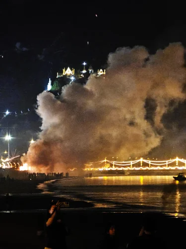 Smoke lingering above Prachuap after the fireworks show